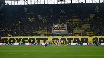 Dortmund fans display banners demanding a boycott of the World Cup in Qatar during the Bundesliga football between Borussia Dortmund and Bochum