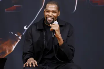 Kevin Durant smiles during a press conference