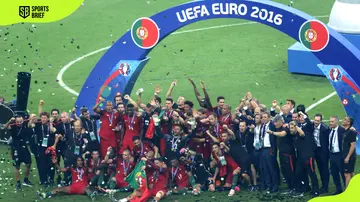 Portugal's players celebrate after beating France during the Euro 2016 final