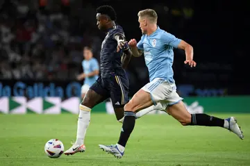 Real Madrid winger Vinicius Junior (L) has been out since August but could return to face Atletico Madrid on Sunday