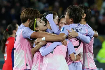 Japan celebrate their 3-1 win over Norway