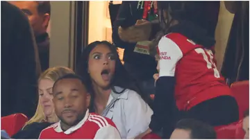 Kim Kardashian watches from the stands with her son Saint West during the UEFA Europa League match between Arsenal FC and Sporting CP at Emirates Stadium. Photo by Marc Atkins.