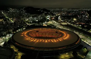 Rio's Maracana stadium is illuminated with a golden light in honor of Pele