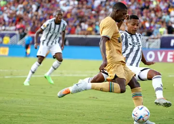 Ousmane Dembele scores for Barcelona in the club's 2-2 draw with Juventus in Dallas on Tuesday