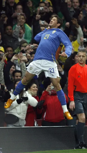 Weight of expectation: Alexandre Pato celebrates scoring against Sweden  in 2008