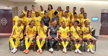 Banyana players pose for a team photo.