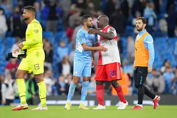 Akinfenwa in action against Man City