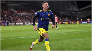 Mason Greenwood celebrates after scoring during the Premier League match between Brentford and Manchester United at Brentford Community Stadium. Photo by Alex Pantling.