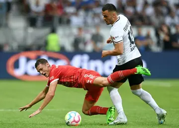 Eintracht Frankfurt winger Filip Kostic (right) is in Turin for his medical before joining Juventus