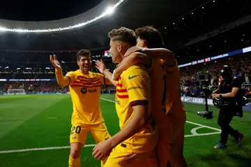 Barcelona midfielder Fermin Lopez celebrates after netting the third goal as his team moved second in La Liga