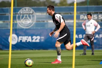 Lionel Messi beams with excitement as he trains with PSG teammates for the first time