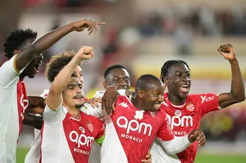 Monaco's Malian midfielder Mohamed Camara (2R) taped over an anti-homophobia logo in their final Ligue 1 game of the season against Nantes on May 19