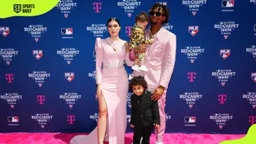 Ronald Acuña Jr. poses for a photo with his wife and kids