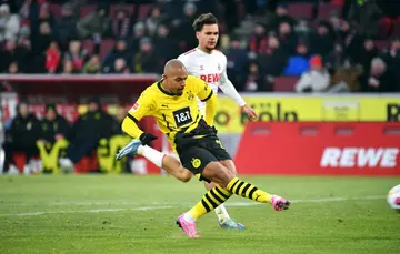 Dortmund forward Donyell Malen scored twice as his side won 4-0 away at Cologne on Saturday