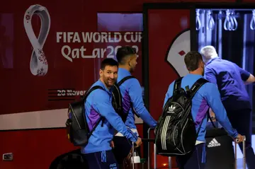 Argentina's forward Lionel Messi and teammates arrive at the Hamad International Airport in Doha on November 17, 2022, ahead of the Qatar 2022 World Cup football tournament.