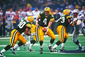 What was Brett Favre's playoff record?