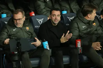 Barcelona coach Xavi said he was standing down at the end of the season with the team third in La Liga and out of the Copa del Rey