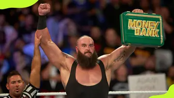 Braun Strowman with the Money in the Bank suitcase