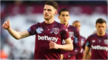 Declan Rice of West Ham United warms up prior to the Premier League match between West Ham United and Manchester United. Photo by Clive Rose.