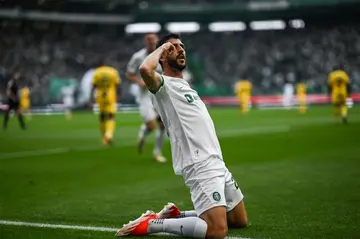 Sporting's Portuguese forward Paulinho celebrates scoring on Saturday with his team's title success wrapped up on Sunday as Benfica lost