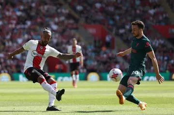 Retired - Southampton forward Theo Walcott (L)