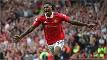 Marcus Rashford celebrates after scoring during the Premier League match between Manchester United and Arsenal FC at Old Trafford. Photo by Tom Purslow.