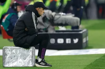 Bayern Munich coach Thomas Tuchel sat on a silver suitcase to watch Saturday's 2-1 win over RB Leipzig.