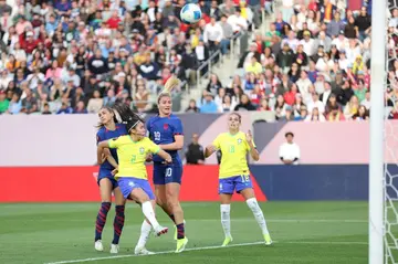 American captain Lindsey Horan heads home the USA's winner in their 1-0 victory over Brazil in the CONCACAF Women's Gold Cup on Sunday