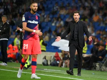 Diego Simeone (R) remains in charge at Atletico Madrid, who have not significantly strengthened