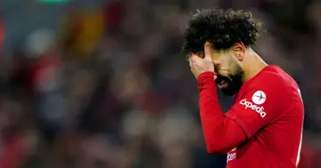 Mohamed Salah handing his head in shame.