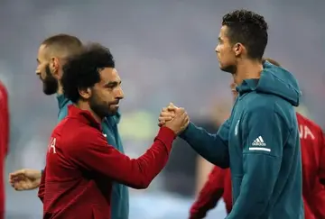 Salah and Ronaldo shake hands ahead of Liverpool vs Real Madrid 2018 UCL final.