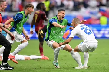 Slovakia players celebrate after beating Belgium in Frankfurt