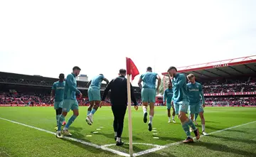 Wolverhampton Wanderers players warm up prior to the Premier League match between Nottingham Forest and Wolverhampton Wanderers at City Ground