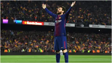 Lionel Messi celebrates after scoring during the La Liga match between Barcelona and Real Madrid at Camp Nou. Photo by David Ramos.