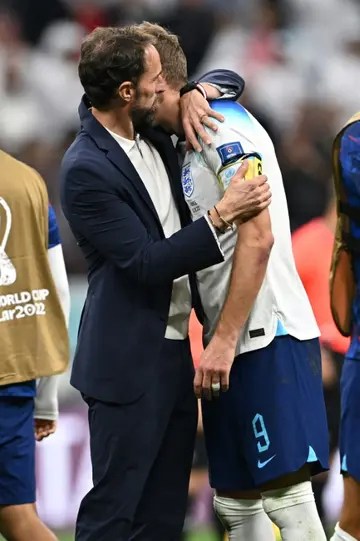 England manager Gareth Southgate consoles Harry Kane as they exited the World Cup in the quarter-finals