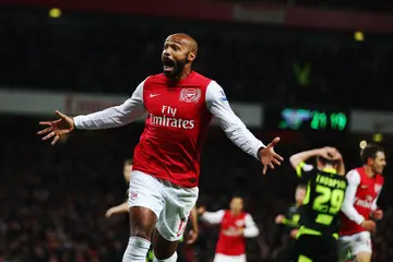 Thierry Henry of Arsenal celebrates scoring