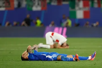 Italy forward Mattia Zaccagni celebrates after securing his team passage to the Euros last 16 with a late goal against Croatia