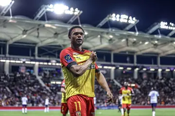 Lois Openda celebrates after scoring for Lens against Toulouse