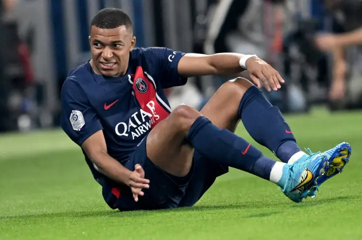 Kylian Mbappe came off in the first half after appearing to hurt his left ankle