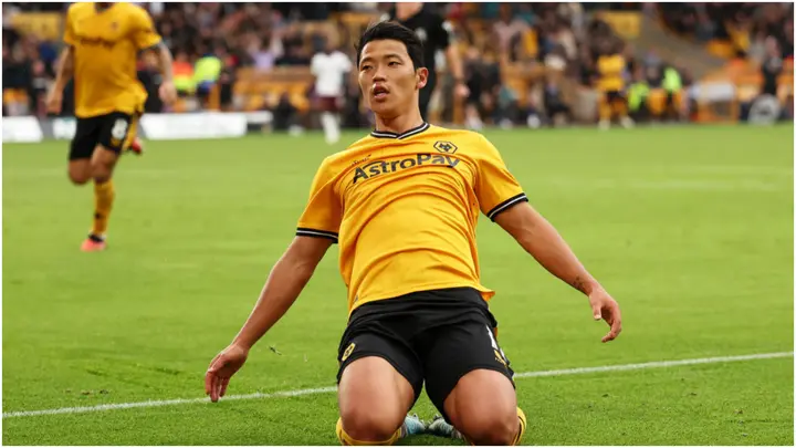 Hwang Hee-Chan celebrates after scoring during the Premier League match between Wolves and Manchester City at Molineux. Photo by Matt McNulty.