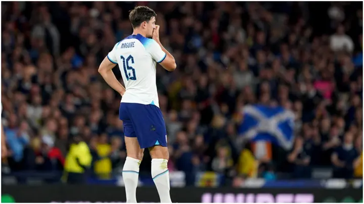 Harry Maguire reacts after scoring an own goal during the international friendly match at Hampden Park. Photo by Andrew Milligan.