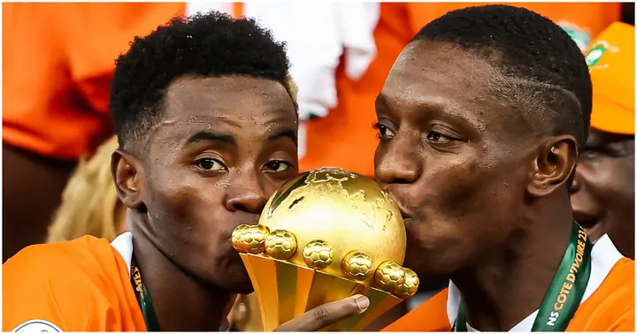 Brighton's Simon Adingra celebrates winning the AFCON trophy with his Ivory Coast teammates.