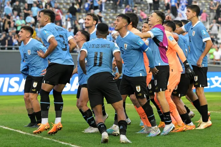 Uruguayan players celebrate after defeating Israel in the  U-20 World Cup semi-final