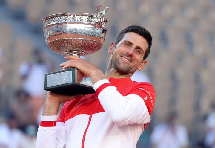 How many trophies does Djokovic have?