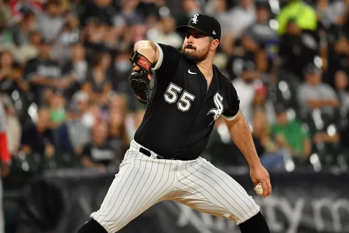 What is Carlos Rodon's record?