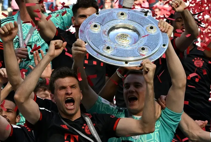 Manuel Neuer and Thomas Mueller celebrate
