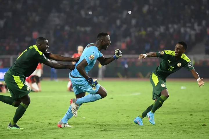 Edouard Mendy (C) played a crucial role in Senegal's victory over Egypt on penalties in the Africa Cup of Nations final