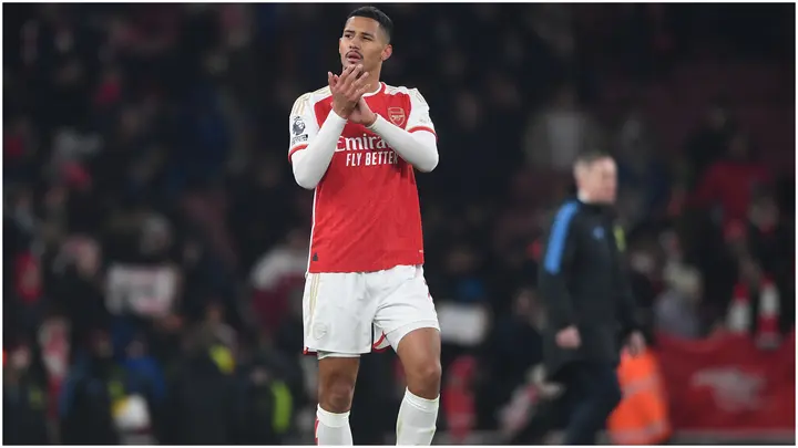 William Saliba applauds the fans after the Premier League match between Arsenal FC and Wolves at Emirates Stadium. Photo by David Price.