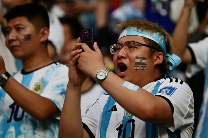 A football fan wears an Argentina football jersey at the Workers' Stadium in Beijing