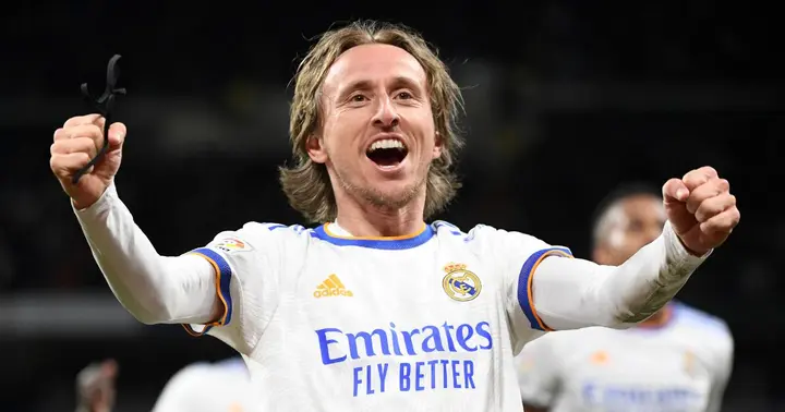 Luka Modric celebrates after scoring for Real Madrid.